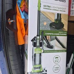 vacuum cleans hard floor and carpet 