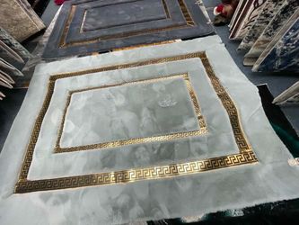 Light Gray Plush Rug with Gold Greek Key Border