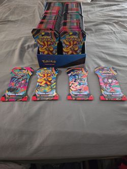 Over 100 CHAOS RISING Pokémon booster packs
