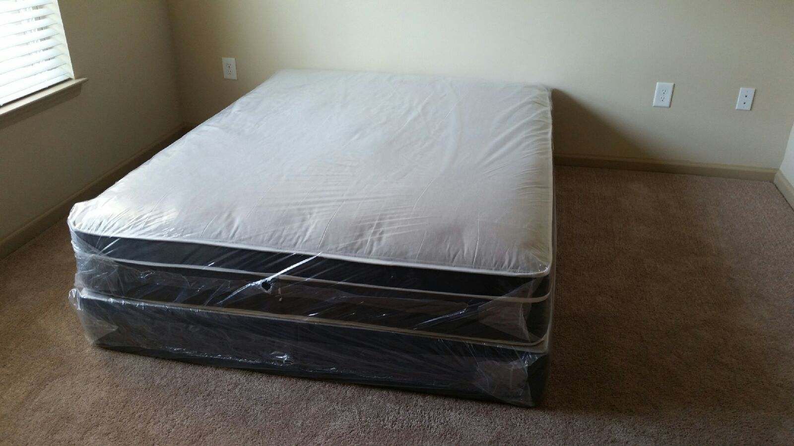 Queen pillow top mattress and box spring in the plastic New Free delivery in Atlanta