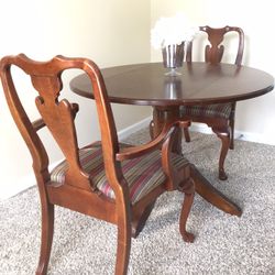 Dining Table and 2 Arm Chairs.  $135