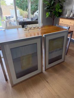 Set of two framed pictures