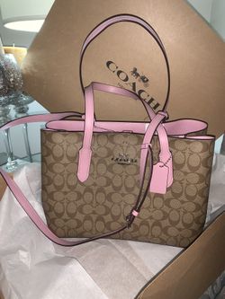 Women's purses in their boxes, ready for this valentine's day half a price. COACH Brand