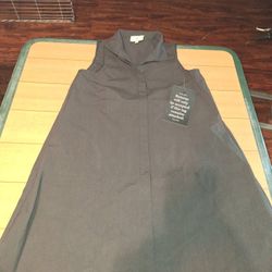 Xxs Tuckernuck Sleeveless Charlie Dress in black cotton blend material with a collared neck and button-front placket. 