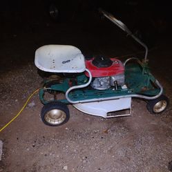 Old lawn mower with Honda engine