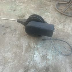 dual rod holder kit for a fishing downrigger. It is a fishing accessory designed to convert a single rod holder setup into a dual one. 