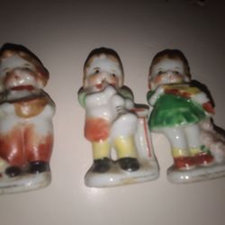 4 China or Porcelain Figurines. Occupied Japan.