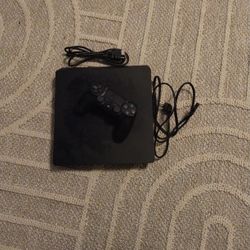 PS4 Slim With One Controller, HDMI Cord, And Power Cord.