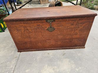 Carved Wood Trunk with Asian Scene Engravings