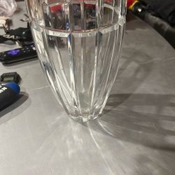 Mikasa 8 inch "Relections" vase. Very heavy (over 4lbs) but is in excellent condition. Fine crystal vase.