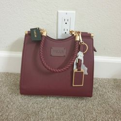 Brand New bebe handbag with price tag & Detachable keychain$79