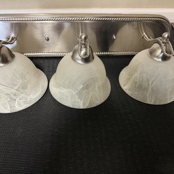 Brushed Nickel 3 Light Vanity Fixture With Elegant Swirled Alabaster Glass Shades