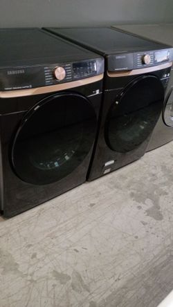 Black Samsung front load set electric with warranty delivery available fee depends on address 🏠🚛🛣️