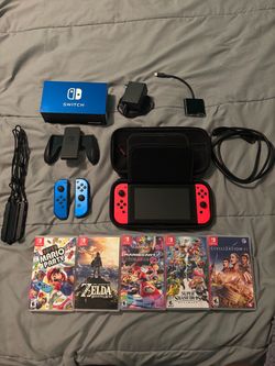 Gen 1 Nintendo switch W/ games and extra joycons