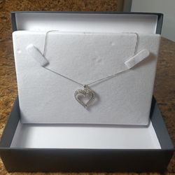 Ladies 10k White Gold Necklace With A 10k White Gold One Carat Diamond Heart Charm. 