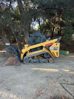 Tree mulcher skid steer leveling brush removal grading