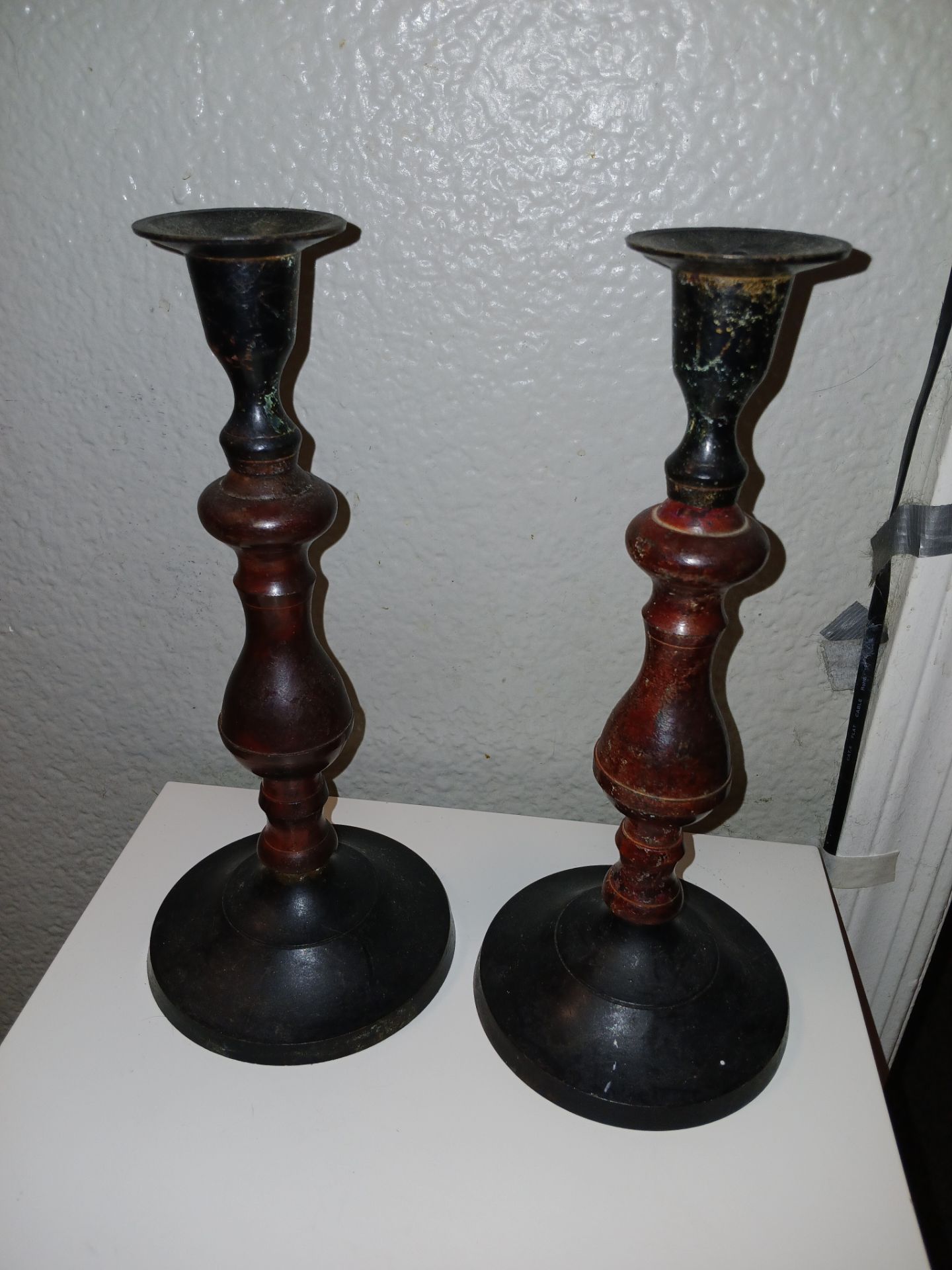Pair of Cold metal or bronze candle sticks