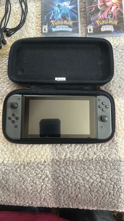 Nintendo Switch with Carrying Case, 8 Games, Pro Controller