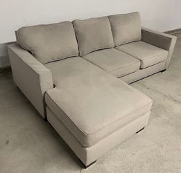 Beige Living Spaces L-Shape Sectional Sofa