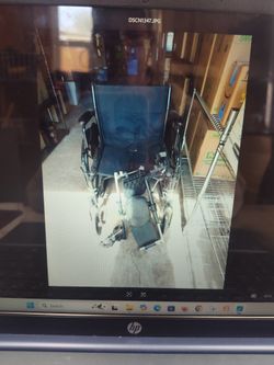 Wide Seat Wheel Chair With Leg Supports