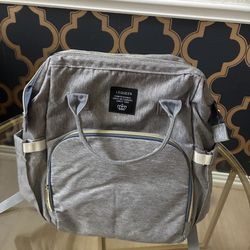 Diaper bag with pull out
