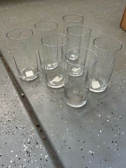 clear glass cylinder vase commonly used for floral arrangements or as a centerpiece.