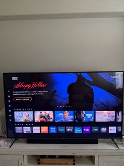 65 inch Vizio Smart TV with Vizio sound bar and subwoofer