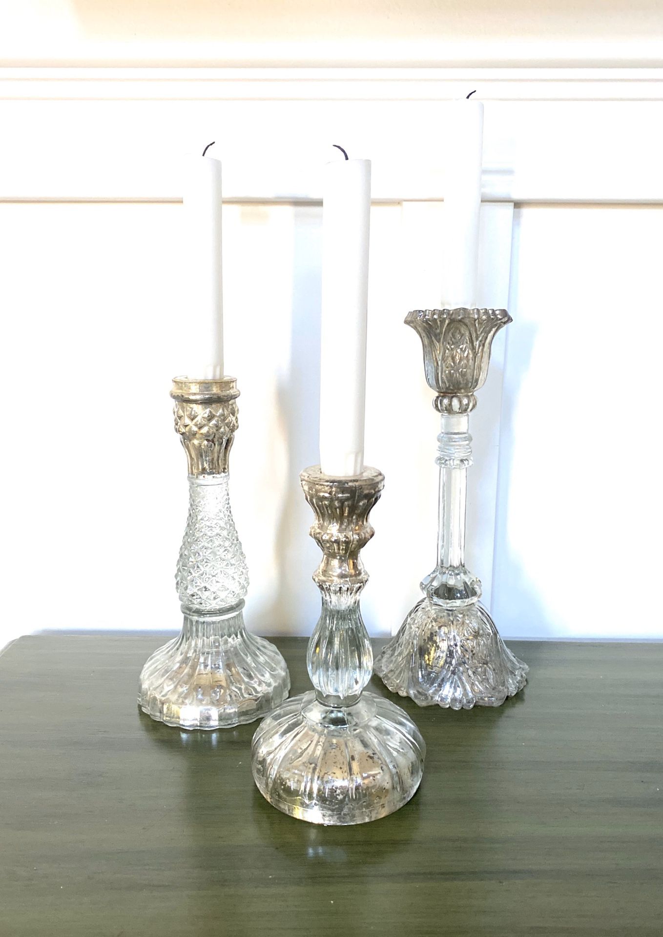 3 Pottery barn clear and mercury glass candle holders.