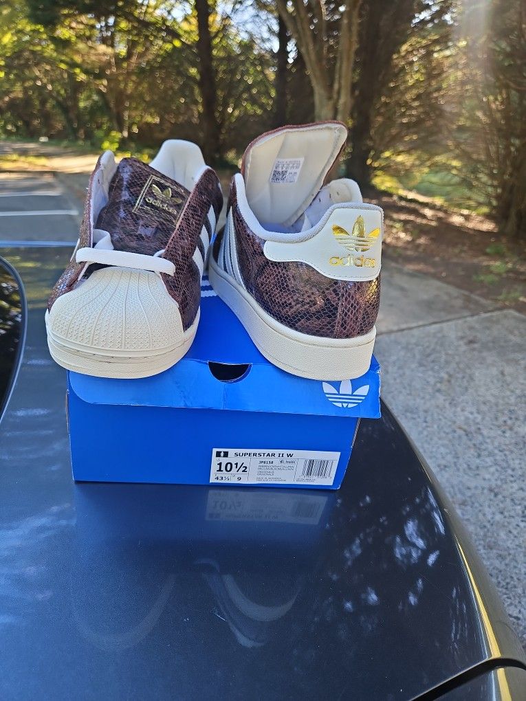 Unisex Adidas W Size 10,5, Men Size 9.5