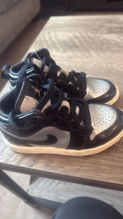 Black and grey Nikes