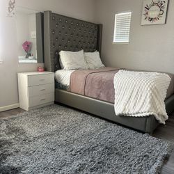Queen Bed With Mattress And One Bedside Table And Rug