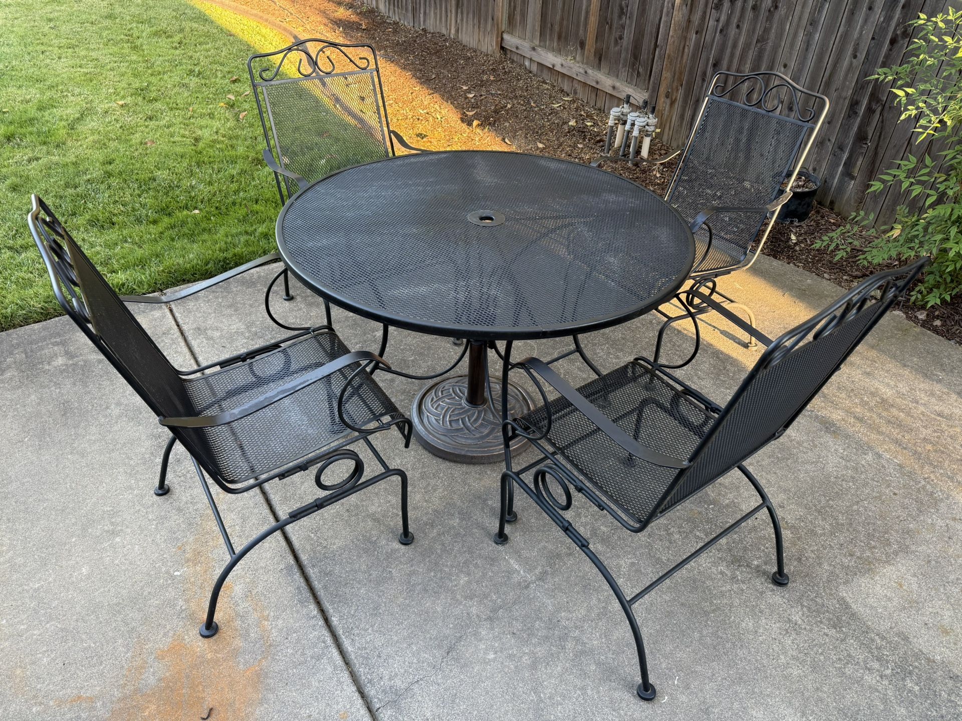 Vintage Wrought Iron 44” patio Table, 4 Rocker Chairs & Umbrella Stand  Price is firm, pick up in Rocklin, no holds, cash only