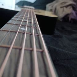 Brand new guitar with case and free pick