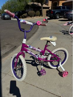 Purple huffy 16 inch bike