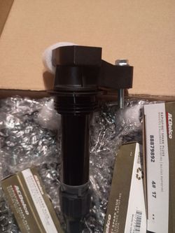GM/Cadillac coils kit with sparkplugs.. all new