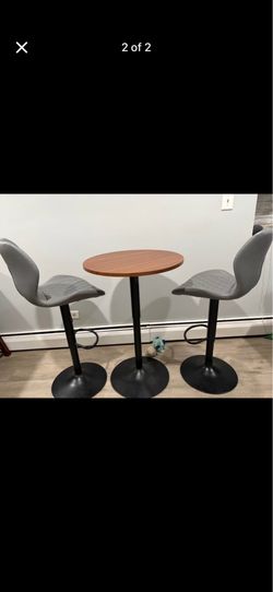 Bar top table and chairs