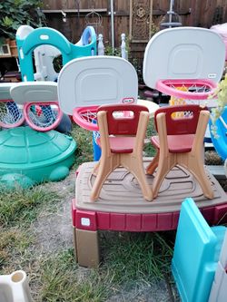 Water table with 2 toddler chairs my dog bit the top $110 all