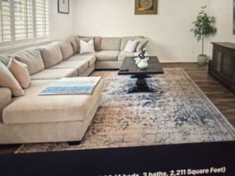 Large Beige L-Shaped Sectional Sofa