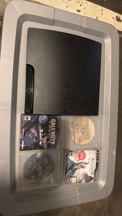 PS3 Slim Console with 4 Games