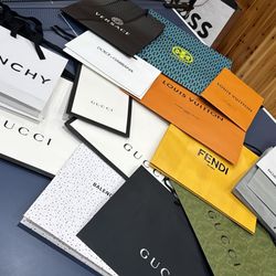 Lot of designer gift bags totes GUCCI FENDI LOUIS VUITTON BALENCIAGA GIVENCHY VERSACE NIKE KITH BOSS LICK SAKS etc 