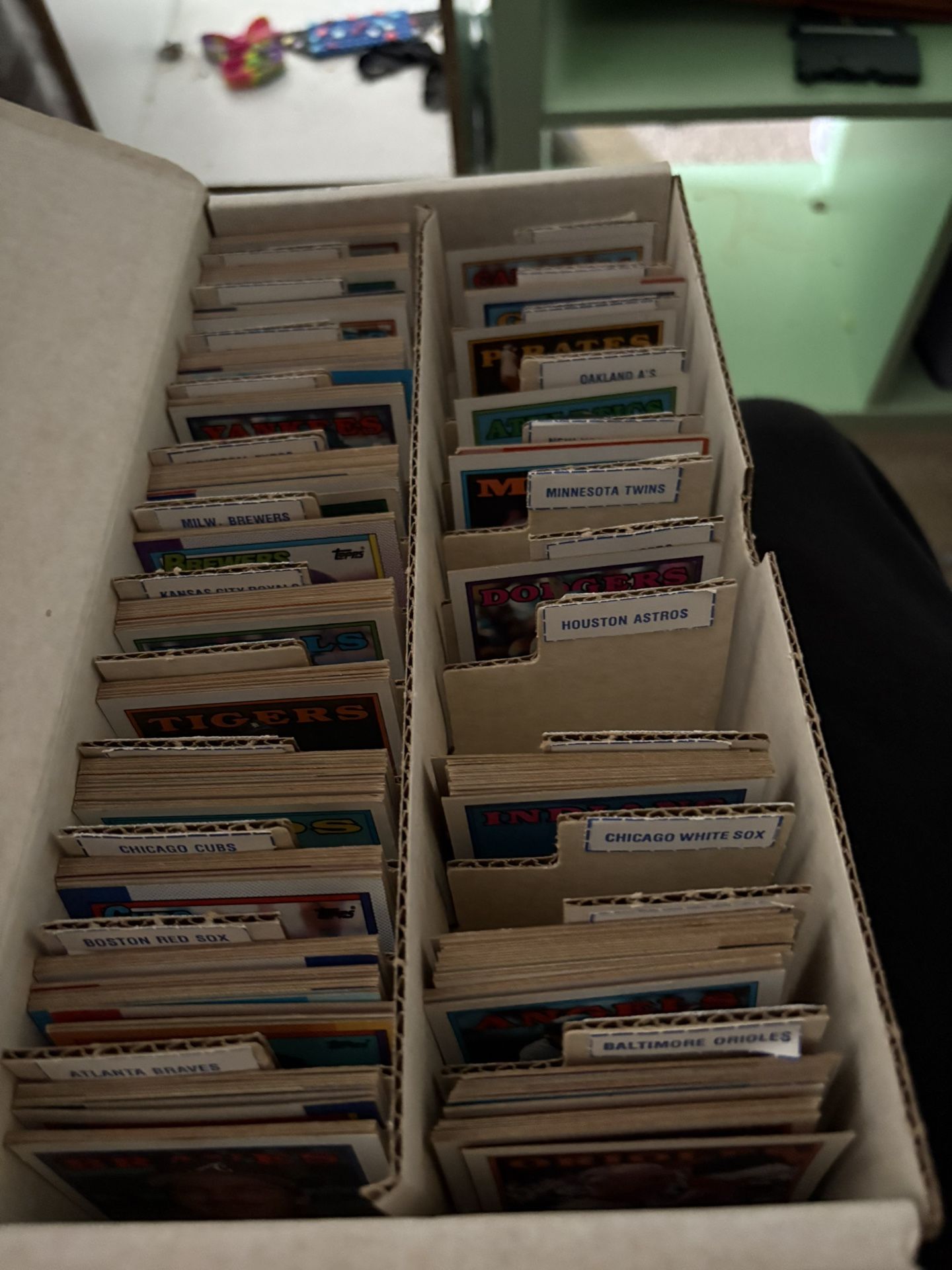 lot of baseball cards organized by team