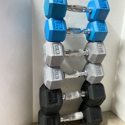 pair of 12,15, and 25lb rubber dumbbells