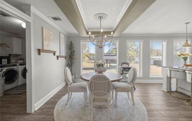 Dining Table With Four Chairs And Rug 