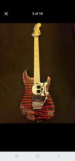 Charvel Warren DeMartini Signature Pro-Mod Blood and Skull electric guitar.