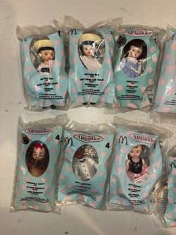 Lot of 14 McDonald’s happy Meals Madame Alexander dolls NIB Dorothy & cowardly lion toys New in original bags. Very collectible