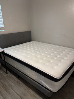 Nearly new king size bed and frame