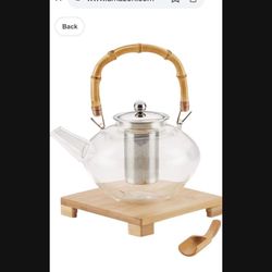 New Glass Tea Kettle On Wooden Plate.  Great Even For Decoration