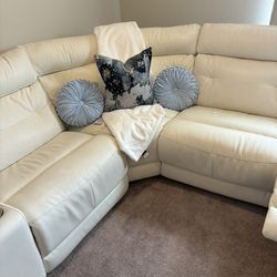 White leather reclining couch