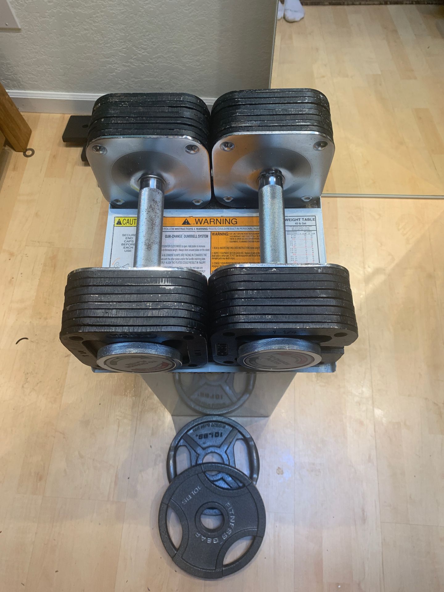 Hoist Adjustable dumbbells 5-45lb & 2x10lb plates