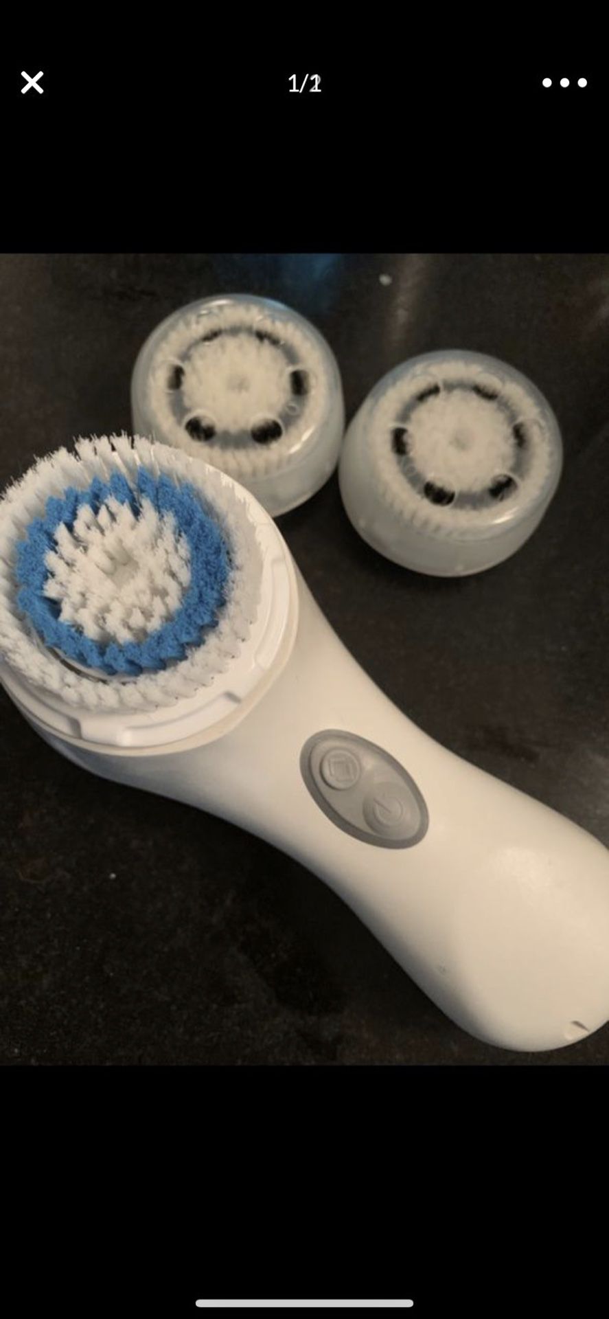 Clarisonic face cleaning brush.